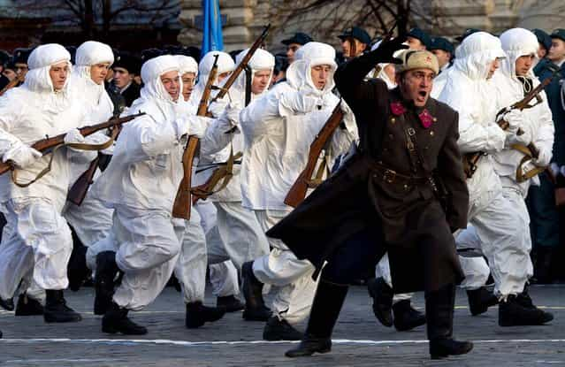 Russian soldiers dressed in Red Army World War II uniforms march in Red Square, November 7, 2012. The parade involved about 6,000 people. (Photo by Misha Japaridze/Associated Press)