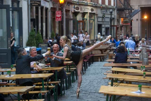 [Dancers Among Us]: Stone Street, NYC – Michelle Joy. (Photo by Jordan Matter)