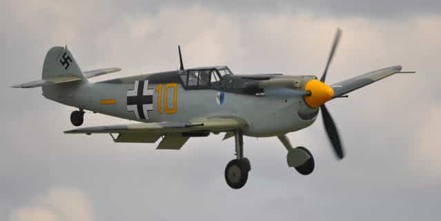 Messerschmitt Bf 109 – Flying Legends Airshow Duxford 2012. The Messerschmitt Bf 109, often called Me 109, was a German World War II fighter aircraft designed by Willy Messerschmitt and Robert Lusser during the early to mid 1930s. It was one of the first truly modern fighters of the era, including such features as all-metal monocoque construction, a closed canopy, a retractable landing gear, and was powered by a liquid-cooled, inverted-V12 aero engine. The Bf 109 first saw operational service during the Spanish Civil War and was still in service at the dawn of the jet age at the end of World War II, during which time it was the backbone of the Luftwaffe's fighter force. From the end of 1941 the Bf 109 was supplemented by the Focke-Wulf Fw 190. (Rob Lovesey)