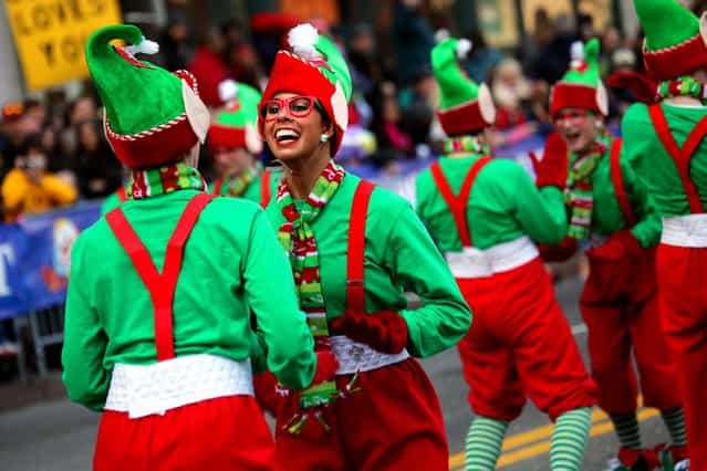 Santa's Elves perform during the American Thanksgiving Parade in downtown Detroi. (Photo by Kimberly P. Mitchell/Detroit Free Press)