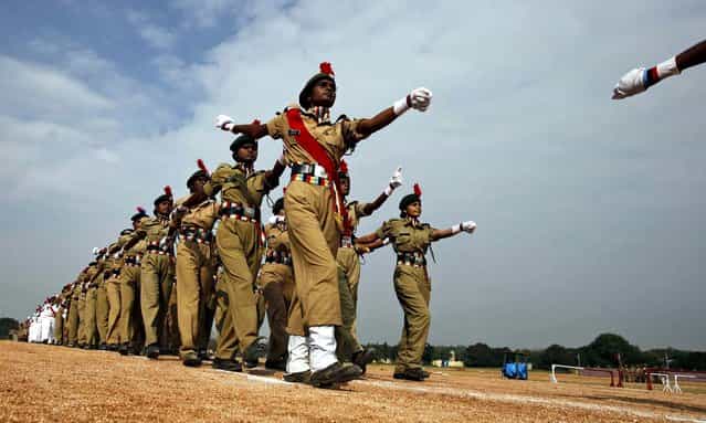 National Cadet Corps cadets march during a parade to mark the anniversary of the NCC in Hyderabad, India, November 22, 2012. NCC is a tri-services organization comprising the Army, Navy and Air Force, engaged in grooming youth into disciplined and patriotic citizens. (Photo by Mahesh Kumar/Associated Press)