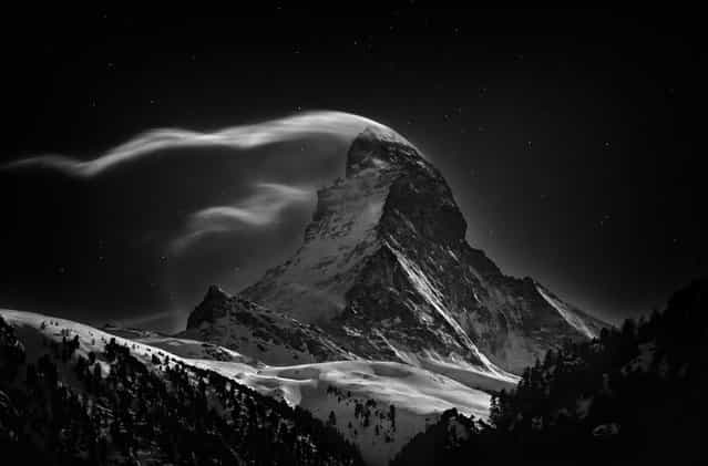 [The Matterhorn: Night Clouds #2 – The Matterhorn, 4478 m, at full moon]. (Photo and comment by Nenad Saljic/National Geographic Photo Contest via The Atlantic)