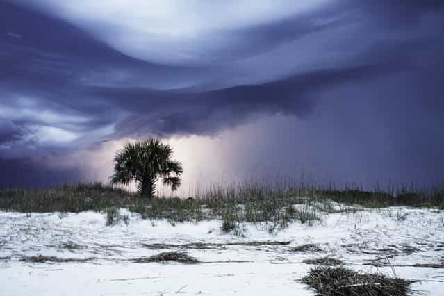 [Lightnng Storm: The coast in the midst of a storm]. (Photo and comment by Anna Ross/National Geographic Photo Contest via The Atlantic)