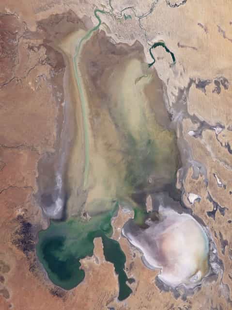 Lake Eyre, Australia. Australia’s Lake Eyre is usually dry, but Landsat 5 caught the image after an unusually wet rainy season in 2009. Image taken by Landsat 5 on June 10, 2009. (Photo by USGS/NASA)