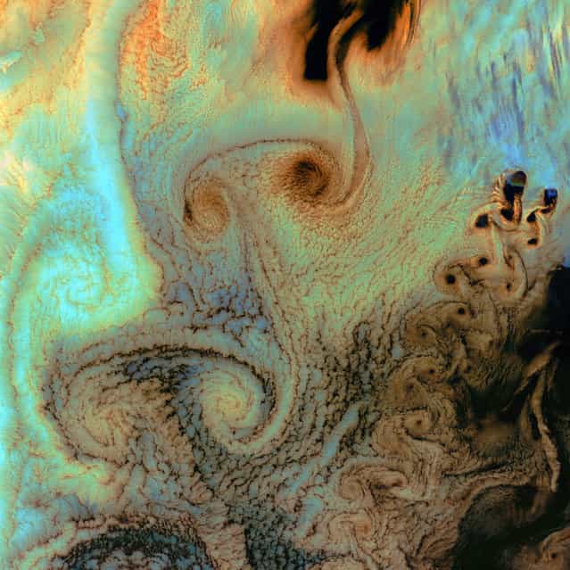 Von Karman Vortices. As air flows over and around objects in its path, spiraling eddies, known as Von Karman vortices, may form. The vortices in this image, taken by Landsat 7 on July 4th, 2002, were created when prevailing winds sweeping east across the northern Pacific Ocean encountered Alaska’s Aleutian Islands. (Photo by NASA/GSFC/USGS EROS Data Center)