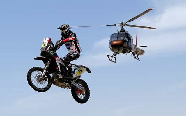 Husqvarna rider Joan Barreda Bort of Spain competes during the 1st stage. (Photo by Victor R. Caivano/Associated Press)