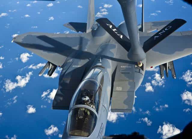 A Florida Air National Guard F-15C [Eagle] takes on fuel from an Alabama Air National Guard KC-135R [Stratotanker] over the Gulf of Mexico off Florida on an aerial refueling flight, January 11, 2013. (Photo by Mark Almond/AL.com)