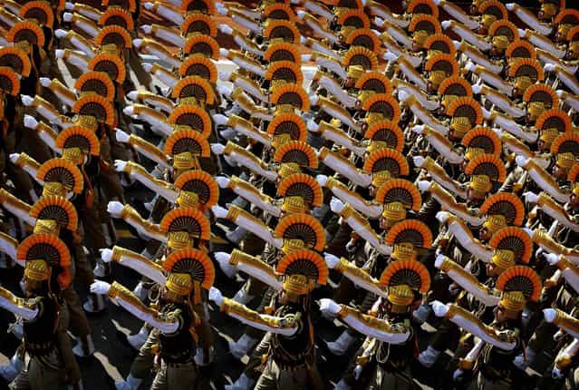 Indian paramilitary forces march during the annual Republic Day parade on Rajpath in New Delh, January 26, 2013. Republic Day commemorates the 1950 adoption of India's constitution. (Photo by Kevin Frayer/Associated Press)