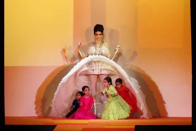 A model presents a creation by French designer Jean Paul Gaultier during the Haute Couture Spring-Summer 2013 collection shows on January 23, 2013 in Paris. (Photo by Pierre Verdy/AFP Photo)