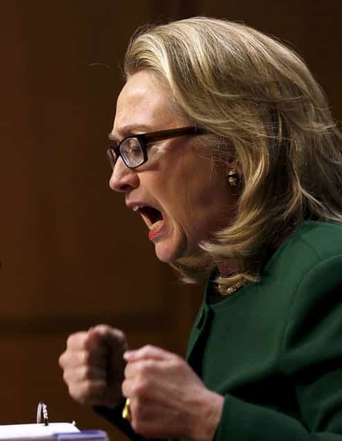 U.S. Secretary of State Hillary Clinton pounds her fists as she responds to intense questioning on the September attacks on U.S. diplomatic sites in Benghazi, Libya, during a Senate Foreign Relations Committee hearing on Capitol Hill in Washington, on January 23, 2013. (Photo by Kevin Lamarque/Reuters)