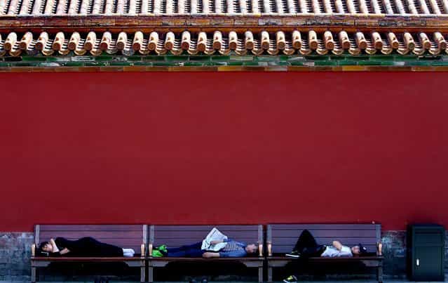 Escaping the sun, and getting some rest, inside Beijing's Forbidden City. (Photo by Mark Edelson/The Palm Beach Post)