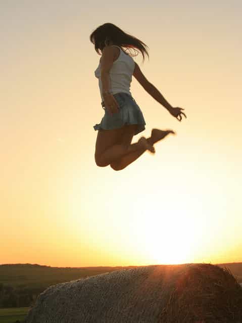 [Jumpology]. [Jumping over sunset]. (Photo by wunderskatz)