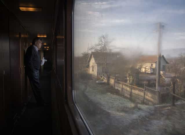 [Return to childhood landscapes. The picture is made in Romania, on the train from Bucharest to Baia Mare in a foggy morning in autumn of 2012]. (Photo and comment by Hajdu Tamas, Romania/2013 Sony World Photography Awards