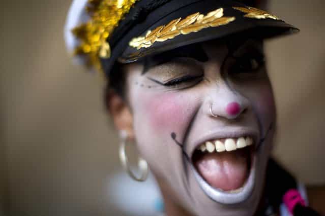 A woman participates in the [Carnaval na Central] block party in Rio. (Photo by Felipe Dana/Associated Press)
