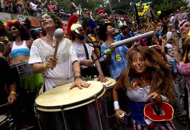 A band performs during the [Ceu na Terra] block party. (Photo by Silvia Izquierdo/Associated Press)