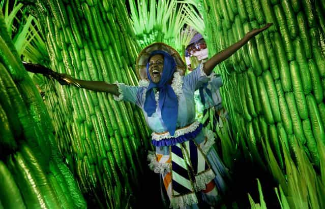 A performer from the Portela samba school participates in the celebrations at the Sambadrome in Rio de Janeiro. (Photo by Silvia Izquierdo/Associated Press)