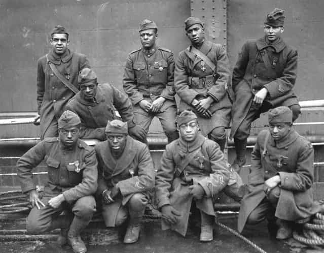 [Some of the colored men of the 369th (15th N.Y.) who won the Croix de Guerre for gallantry in action, 1919]. Left to right. Front row: Pvt. Ed Williams, Herbert Taylor, Pvt. Leon Fraitor, Pvt. Ralph Hawkins. Back Row: Sgt. H. D. Prinas, Sgt. Dan Strorms, Pvt. Joe Williams, Pvt. Alfred Hanley, and Cpl. T. W. Taylor. (Photo by an unknown photographer)