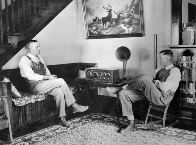 [Farmer and his son listening in the evenings, Shawnee county, Kansas, September 23 or 24, 1924]. (Photo by George W. Ackerman)