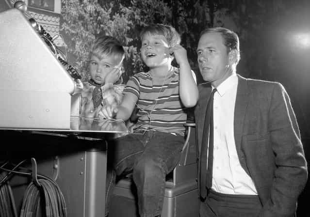 Ronny Howard, center, who plays Opie on [The Andy Griffith Show], is joined by his real-life father Rance Howard and little brother Clint in an episode of the show, marking the first time that all three Howards had worked in a TV show together, in 1963. (Photo by AP Photo)