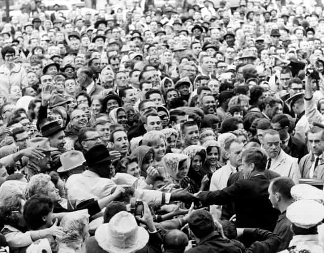 President John F. Kennedy greets a crowd at a political rally in Fort Worth, Texas in this November 22, 1963 photo by White House photographer Cecil Stoughton. (Photo by Cecil Stoughton/Reuters/JFK Library/The White House)