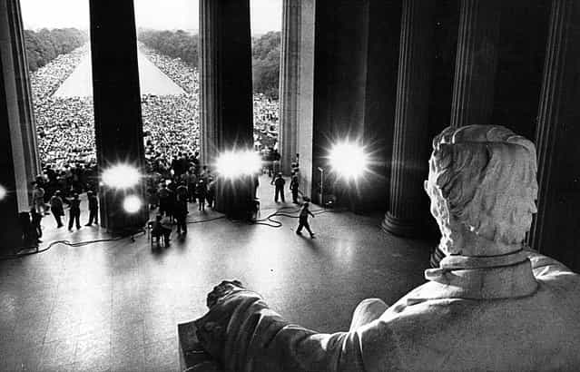 The statue of Abraham Lincoln is illuminated during a civil rights rally, on August 28, 1963 in Washington, D.C. (Photo by National Archive/Newsmakers)