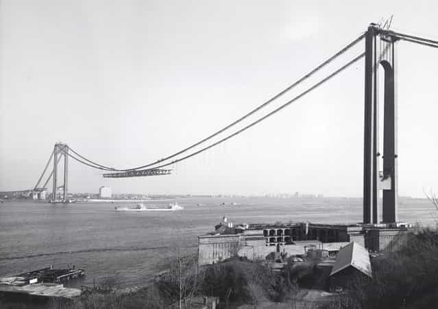 New York's Verrazano-Narrows Bridge, linking Brooklyn to Staten Island, under construction, on December 4, 1963. The bridge, with a span of 4,260 feet, opened to traffic on November 21, 1964. (Photo by AP Photo/Museum of the City of New York)