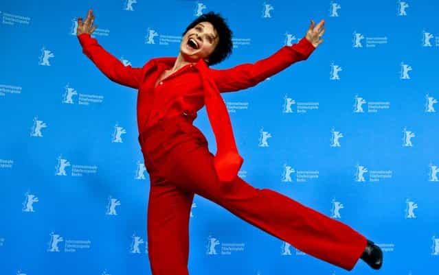 Actress Juliette Binoche jumps at the photo call of the film Camille Claudel 1915 at the 63rd edition of the Berlinale, International Film Festival in Berlin, German, on February 13, 2013. (Photo by Gero Breloer/Associated Press)
