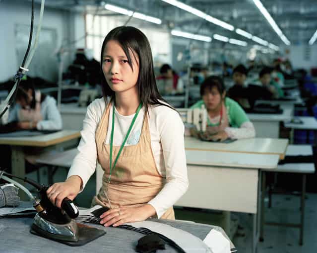 Liu Baozhu (25), Worker at textile factory. Nanshui, Guangdong. (Photo by Mathias Braschler and Monika Fischer)