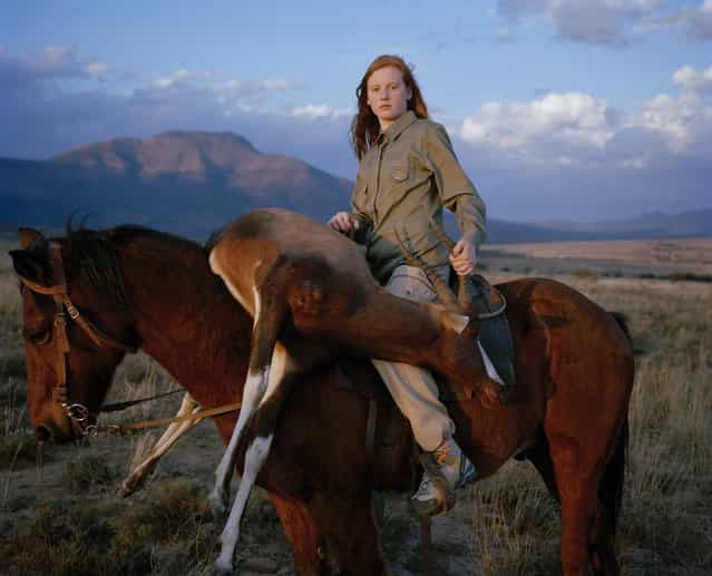 [Huntress with Buck from the series «Hunters»]. Taylor Wessing photographic portrait prize 2010. (Photo by David Chancellor)