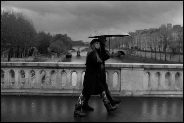 Love often feels simple, and beautiful, and that is how I feel about Paris always, and never more than on a rainy Sunday morning in early November, on my way for my first double expresso. (Photo and comment by Peter Turnley)