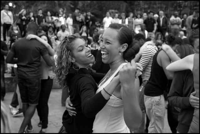 Dancing Kizomba in Paris-a beautiful sensual dance with origins from Angola, resembling Zouk, along the banks of the Seine on Sunday early evening-if you've never seen this dance or heard this music-once you have, you'll never forget it-wonderful! (Photo and comment by Peter Turnley)