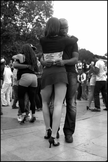 Dancing Kizomba along the Seine in Paris-a beautiful sensual dance with origins from Angola, resembling Zouk, this Sunday early evening-if you've never seen this dance or heard this music-once you have, you'll never forget it-wonderful! (Photo and comment by Peter Turnley)