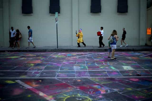 A section of downtown Lake Worth street was dedicated to children so they could practice their street painting technique. (Photo by Thomas Cordy/The Palm Beach Post)