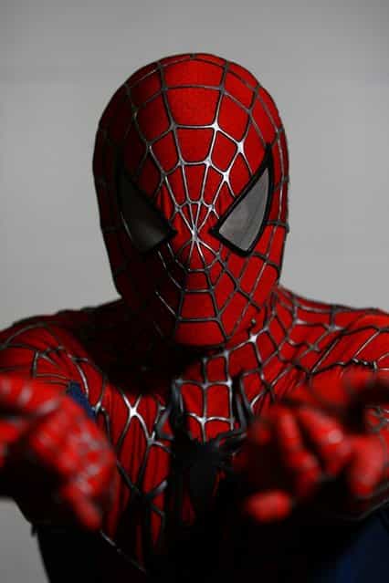 An actor dressed as Spiderman poses for a photo at the London Super Comic Convention at the ExCeL Centre on February 23, 2013 in London, England. Enthusiasts at the Comic Convention are encouraged to wear a costume of their favourite comic character and flock to the ExCeL to gather all the latest news in the world of comics, manga, anime, film, cosplay, games and cult fiction. (Photo by Jordan Mansfield)