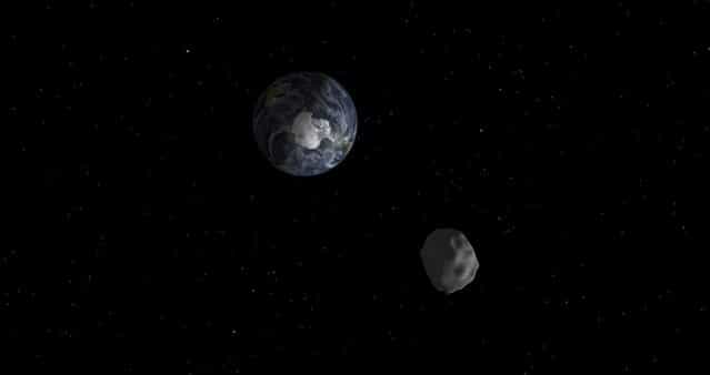 The passage of asteroid 2012 DA14 through the Earth-moon system, is depicted in this handout image from NASA. On February 15, 2013, an asteroid, 150 feet (45 meters) in diameter will pass close, but safely, by Earth. The flyby creates a unique opportunity for researchers to observe and learn more about asteroids. (Photo by NASA/Reuters/JPL-Caltech/Handout)