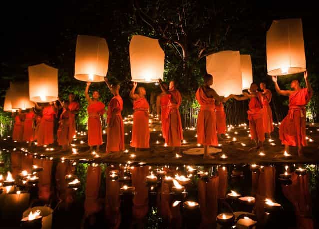 [Monks Releasing Lanterns During Loy Krathong in Chiang Mai, Thailand]. Photo by Daniel Nahabedian (Chiang Mai, Thailand). Photographed in Chiang Mai, Thailand, November 2012.