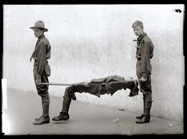 Three Boy Scouts Training Demonstration, photographed by Harris & Ewing in 1912.
