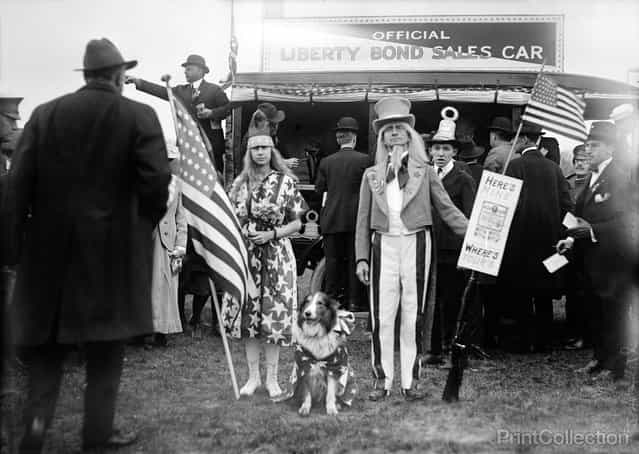Liberty Loans, Liberty Bond Sales Car, John N. Stevenson as [Uncle Sam] and Girl in Star-Spangled Dress with Star-Spangled Dog. Photographed by Harris & Ewing in 1918 on 5 x 7 in. glass plate negative. Sign reads [Hear's Mine Where's Yours?]