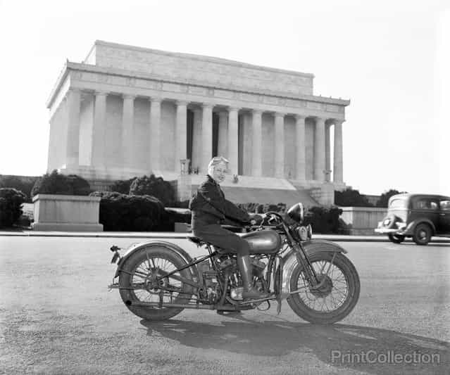 [Washington, D.C., September 15, 1937. Although she weights only 88 pounds – one-third of the machine she rides, Mrs. Sally Halterman is the first woman to be granted a license to operate a motorcycle in the District of Columbia. She is 27 years old and 4 feet, 11 inches tall. Immediately after receiving her permit, Mrs. Halterman was initiated into the D.C. Motorcycle Club – the only girl ever to be accorded this honor]. Photographed by Harris & Ewing.