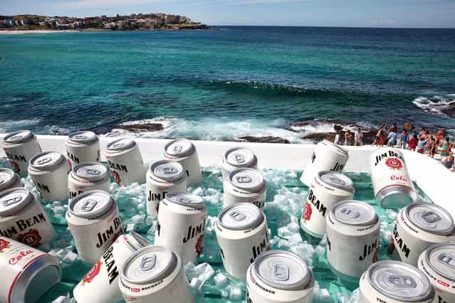 The Bondi Icerbergs Pool was converted into a giant esky ice chest during the filiming of a Jim Beam commercial at Bondi Icebergs on March 21, 2013 in Sydney, Australia. (Photo by Marianna Massey)