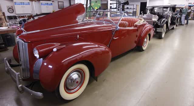 A 1940 Packard 120 Darrin Convertible Victoria awaits the start of restoration work Tuesday, March 5, 2013 at L'Cars Automotive Specialties in Cameron, Wis. The company which does high-end restoration and customization work classic cars that have won awards at the world-renowned Pebble Beach Concours d'Elegance. Winning cars include a 57c Bugatti, Rolls Royce PIII V12, V12 Aero coupe, T44 Bugatti, T55 Bugatti, T38A Bugatti, Mercedes Benz 290 Roadster, Rolls Royce Silver Ghost, T57 Bugatti, 1929 Duesenberg J, Mercedes Benz 540K cabriolet, Talbot Teardrop and a 1931 V16 Cadillac convertible. (Photo by Mark Hoffman)