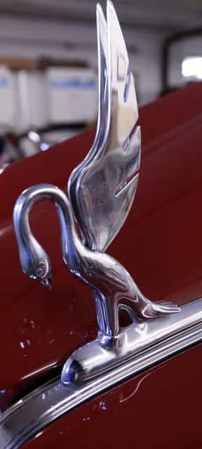 This is the hood ornament on a 1940 Packard 120 Darrin Convertible Victoria shown Tuesday, March 5, 2013 at L'Cars Automotive Specialties in Cameron, Wis. The company which does high-end restoration and customization work classic cars that have won awards at the world-renowned Pebble Beach Concours d'Elegance. Winning cars include a 57c Bugatti, Rolls Royce PIII V12, V12 Aero coupe, T44 Bugatti, T55 Bugatti, T38A Bugatti, Mercedes Benz 290 Roadster, Rolls Royce Silver Ghost, T57 Bugatti, 1929 Duesenberg J, Mercedes Benz 540K cabriolet, Talbot Teardrop and a 1931 V16 Cadillac convertible. (Photo by Mark Hoffman)