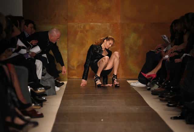 A model slips and falls while presenting a creation from the Herve Ledger by Max Azria Fall 2009 collection during New York Fashion Week February 15, 2009. (Photo by Eric Thayer/Reuters)