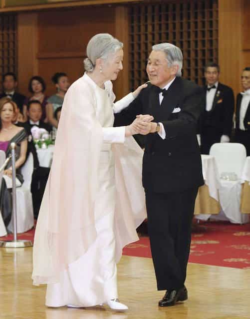 Japan's Emperor Akihito and Empress Michiko dance at a charity dance party at a hotel in Tokyo in this April 12, 2013 photo released by Kyodo. It was the first time in twenty years that the monarch danced before the public, local media reported. (Photo by Reuters/Kyodo)