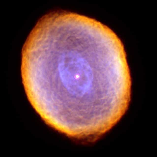 Planetary nebula IC 418, known as the Spirograph Nebula, located 2,000 light years from Earth, is seen in this photo from the Wide Field Planetary Camera 2 aboard NASA's Hubble Space Telescope. (Photo by Dr. Raghvendra Sahai and Dr. Arsen R. Hajian/AP Photo/NASA/The Hubble Heritage Team)