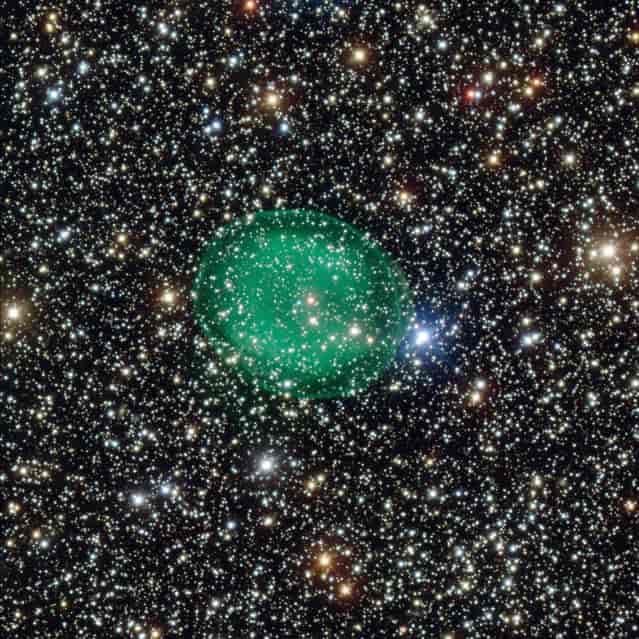 This intriguing picture from ESO’s Very Large Telescope shows the glowing green planetary nebula IC 1295 surrounding a dim and dying star. It is located about 3,300 light-years away in the constellation of Scutum (The Shield). The new image, released on April 10, 2013 by the European Southern Observatory, shows the planetary nebula IC 1295 like it has never been seen before. This picture, which ESO scientists dubbed [ghostly], marks the first time the nebula has been imaged such unprecedented detail. (Photo by ESO)