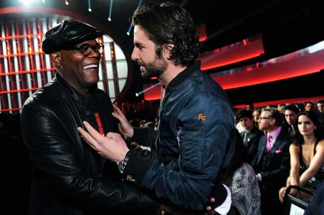 Samuel L. Jackson and Bradley Cooper greet each other in the audience. (Photo by Jordan Strauss/Invision for MTV)