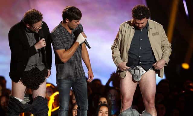 Seth Rogen, Zac Efron and Danny McBride present the award for best shirtless performance. (Photo by Matt Sayles/Invision)