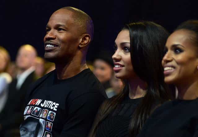 Jamie Foxx, Corinne Bishop and Kerry Washington watch the performances. (Photo by Jordan Strauss/Invision for MTV)