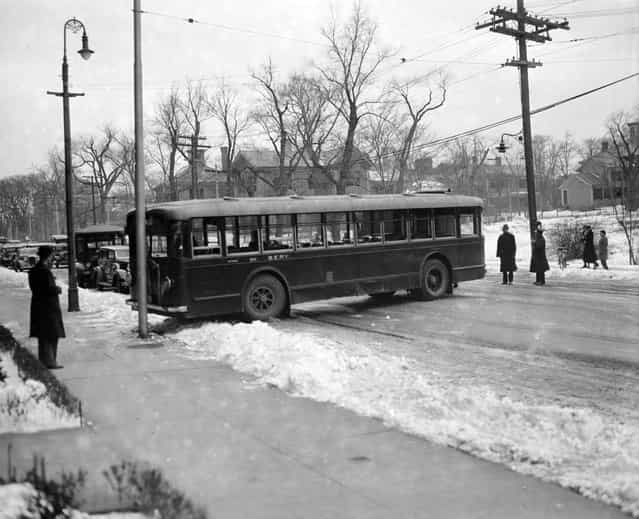 Bus goes sideways on icy road, circa 1930. (Photo by Leslie Jones)